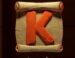 Symbol Písmeno K automatu Might of Light od eGaming